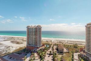 an aerial view of the beach and two tall buildings at Portofino 2-1906 in Pensacola Beach