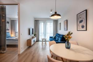 Ένα ή περισσότερα κρεβάτια σε δωμάτιο στο Old Bank Apartment