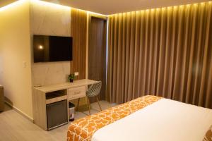 Hotel y Cabañas Covemar客房内的一张或多张床位