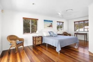 Ένα ή περισσότερα κρεβάτια σε δωμάτιο στο 10 Wesley Court Noosa Heads +25 φωτογραφίες