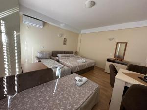 Cama o camas de una habitación en Sadi Apartments