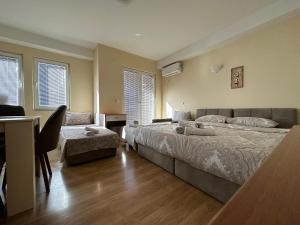 Cama o camas de una habitación en Sadi Apartments
