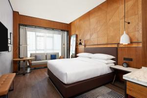 Llit o llits en una habitació de Four Points by Sheraton Yiyang