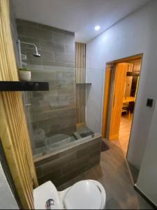 Een badkamer bij Carcamanes 17 Gastro-Hotel