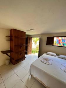 Postel nebo postele na pokoji v ubytování Bem Me Quer Casas + 37 fotografií
