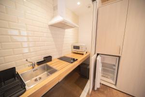 Kuchyňa alebo kuchynka v ubytovaní APARTAMENTOS CASA ARADIÑA + 10 fotografií