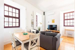 אזור ישיבה ב-Neptuno Boutique Apartment - No coração do centro de Aveiro