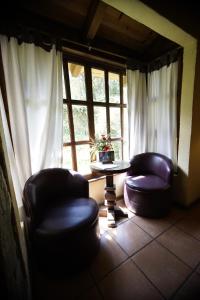 Posezení v ubytování Cabañas La Cascada