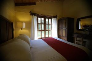 Postel nebo postele na pokoji v ubytování Cabañas La Cascada
