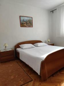 Posteľ alebo postele v izbe v ubytovaní Apartments by the sea Tkon, Pasman - 8297