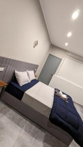 A bed or beds in a room at Bedcoin Hostel