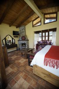 Postel nebo postele na pokoji v ubytování Cabañas La Cascada