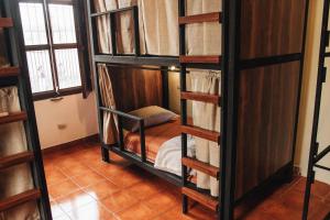 Postel nebo postele na pokoji v ubytování Flore Hostel