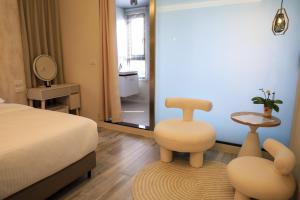 Postel nebo postele na pokoji v ubytování 鴝花甜點民宿 QuHua Sweety B&B