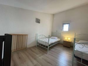 Postel nebo postele na pokoji v ubytování Appartement Châtelaillon-Plage, 3 pièces, 4 personnes - FR-1-246-647