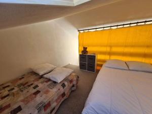 Posteľ alebo postele v izbe v ubytovaní Maison 2 pièces avec mezzanine, à 400m de la plage, parking, jardin privé, 6 couchages - Saint-Hilaire-de-Riez - FR-1-224C-218