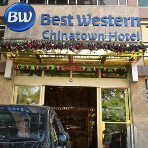 a building with a blu best western chicagoormon hotel at Best Western Chinatown Hotel in Yangon