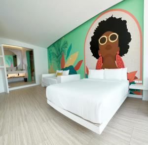 Tempat tidur dalam kamar di Hotel Nomadic Design
