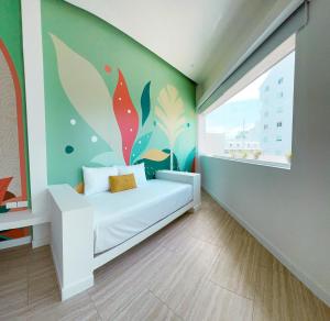 Un ou plusieurs lits dans un hébergement de l'établissement Hotel Nomadic Design