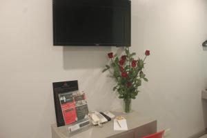 TV a/nebo společenská místnost v ubytování ML SUITES CEBU