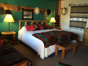 Ein Bett oder Betten in einem Zimmer der Unterkunft Inn on the Rio