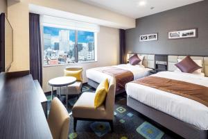 Postel nebo postele na pokoji v ubytování Hotel Mystays Premier Akasaka