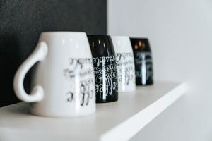 Coffee and tea making facilities at Gemütliche Wohnung im Zentrum Top 2