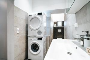 A bathroom at Gemütliche Wohnung im Zentrum Top 2