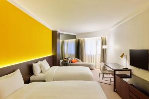 Ліжко або ліжка в номері Prince Hotel, Marco Polo
