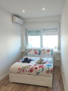 Llit o llits en una habitació de Com conforto na Lapa, Porto