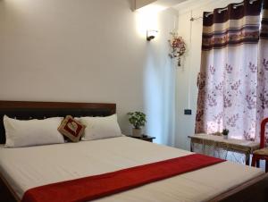 Кровать или кровати в номере Atithi Griha Homestay - ARITAR, SILK ROUTE, SIKKIM