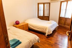 Posteľ alebo postele v izbe v ubytovaní Amplio apartamento en pleno centro de Salta