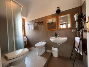 Koupelna v ubytování Hotel Mom Assisi