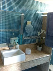 Een badkamer bij Best Barra Beach Apartment