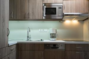 Køkken eller tekøkken på Ferienwohnung Alpenwelt + 17 billeder