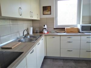 Kjøkken eller kjøkkenkrok på Apartma Gorjan