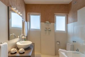 Kúpeľňa v ubytovaní Living4Malaga Majestic Granada Street + 16 fotografií