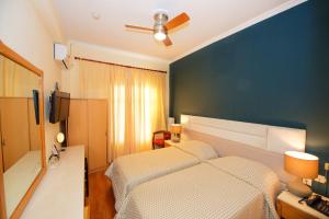 Postel nebo postele na pokoji v ubytování Hotel Dalia