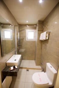 Koupelna v ubytování Hotel Dalia