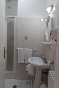 Koupelna v ubytování Hotel Mom Assisi