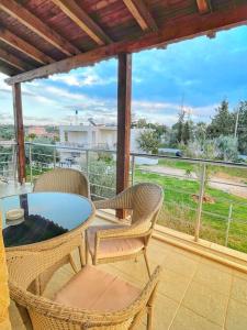 A balcony or terrace at Kathiana cozy apartment