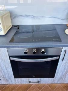 A kitchen or kitchenette at Kathiana cozy apartment