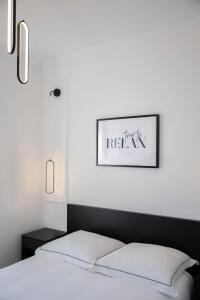 Posteľ alebo postele v izbe v ubytovaní MONACO SEA VIEW APARTMENTS