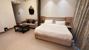Letto o letti in una camera di 21st Floor SkyStudio Suite with Balcony