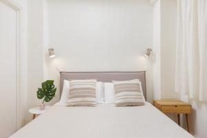 Posteľ alebo postele v izbe v ubytovaní Aloe Apartments