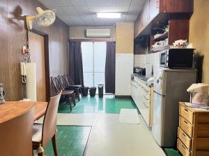 Kuchyň nebo kuchyňský kout v ubytování Hostel Tomal