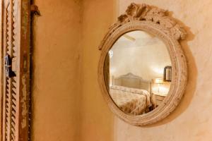 A bed or beds in a room at Gallery Guesthouse