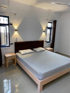 Postel nebo postele na pokoji v ubytování Residence La Colombe