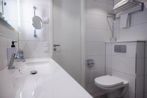 Vannituba majutusasutuses Quality Hotel Royal Corner