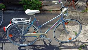 a bike parked on the side of the street at Fregata 16 in Jastrzębia Góra